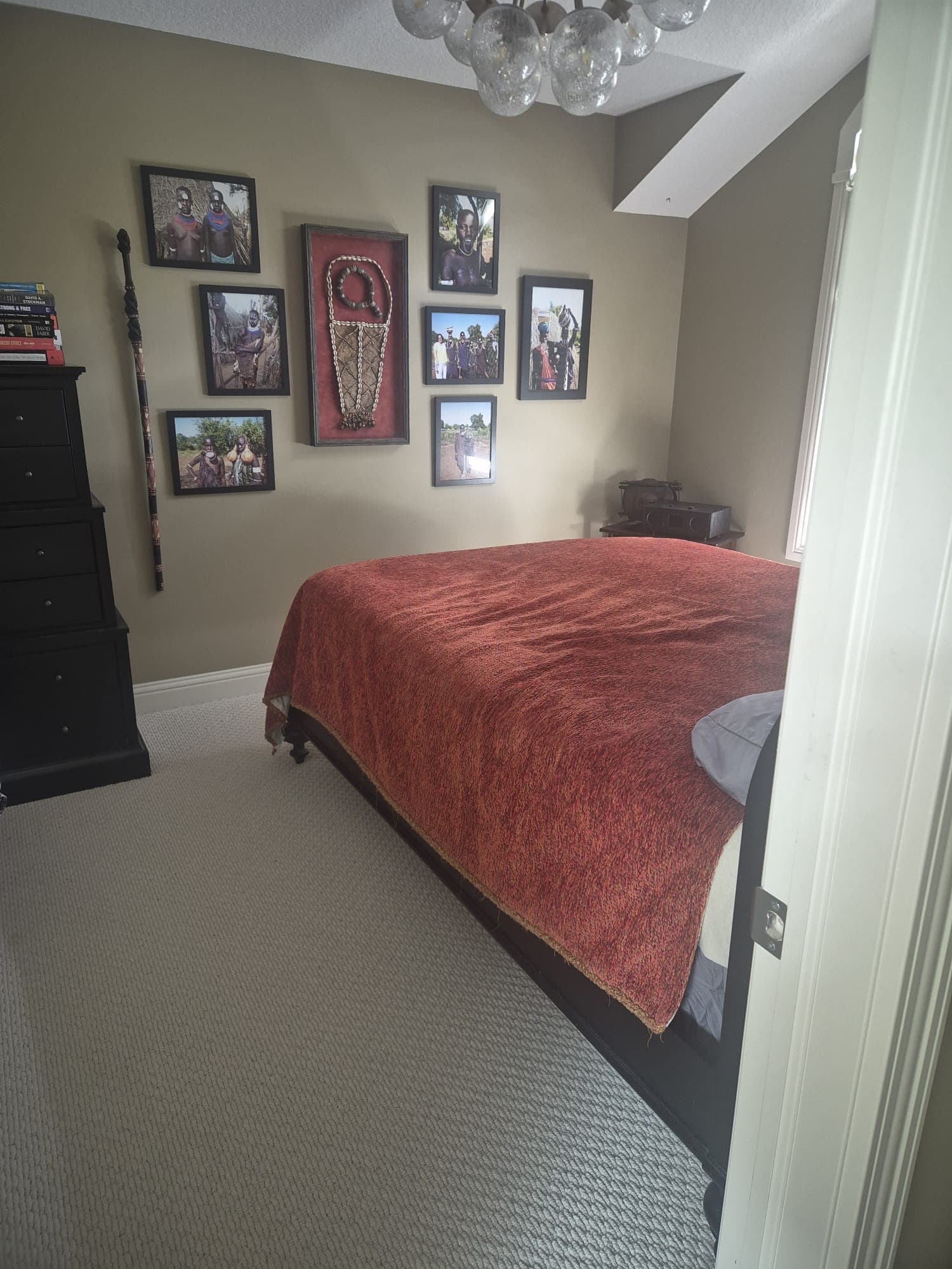 Guest bedroom with new wool berber carpet, bed and side table reset in place